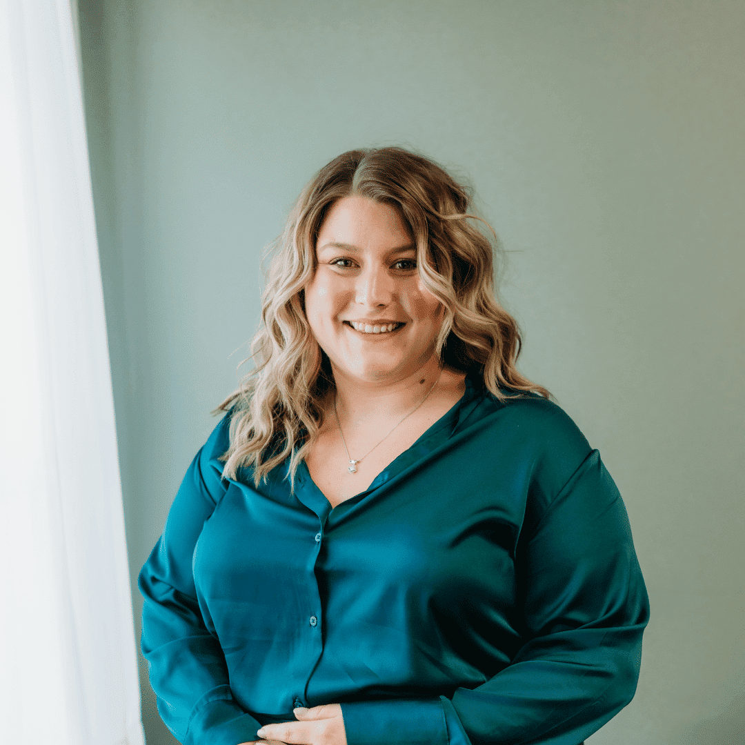 Portrait of Lexy Goshe, a professional stylist at Tangles Salon, showcasing their expertise and style.